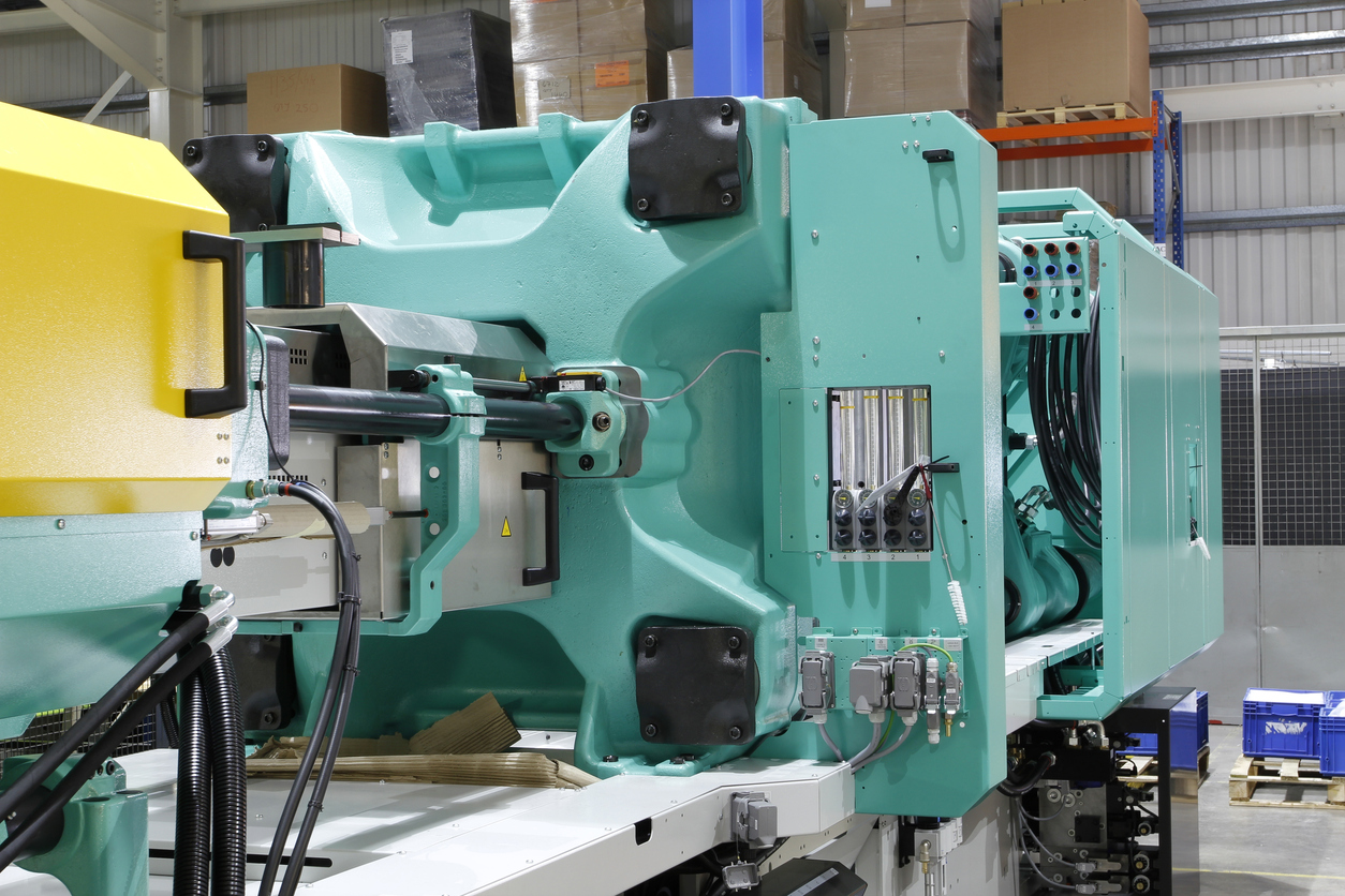 Injection molding machine used for the forming of plastic parts using plastic resin and polymers.